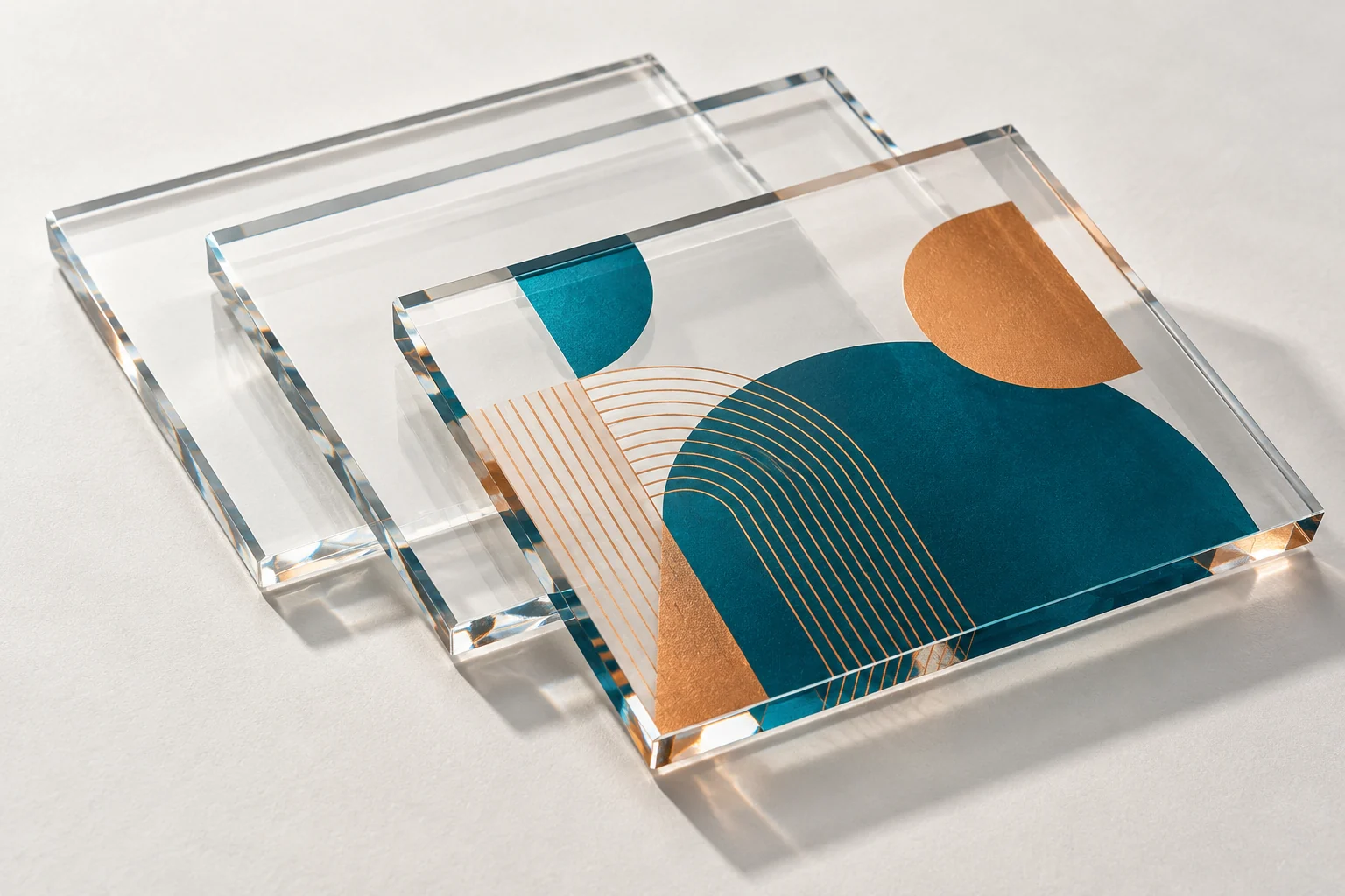 Illustrative clear acrylic sheets with geometric print and polished edges.
